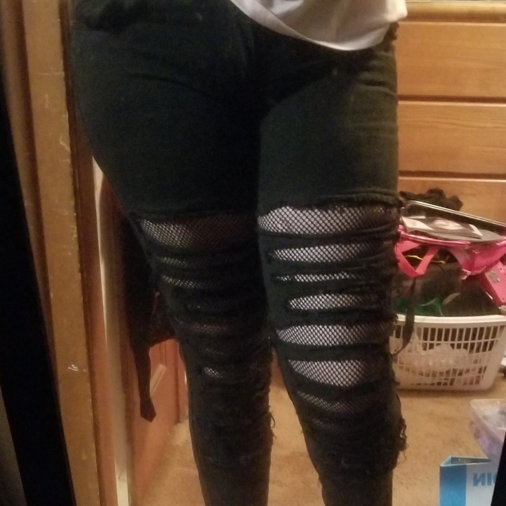 Ripped fishnet black jeans